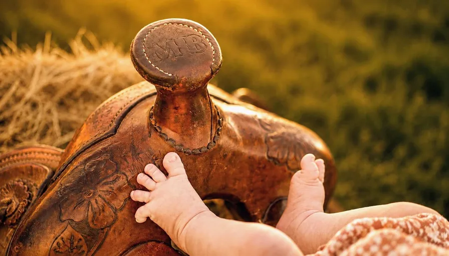 Newborn baby feet at golden hour